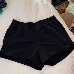 Pact Women's Black Stretch French Terry Curved Hem Short L